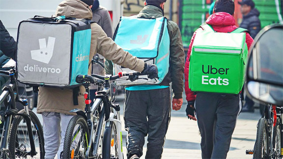 Coursiers Uber Eats et Deliveroo